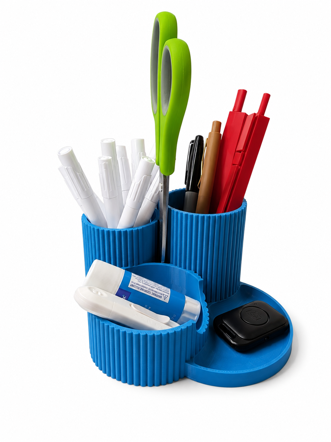 Blue desk organizer with various stationery items on a white background