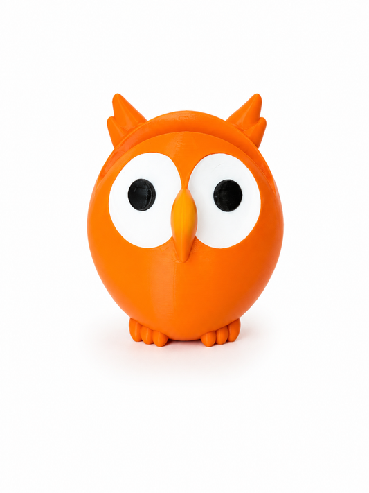 Orange owl-shaped object on a white background