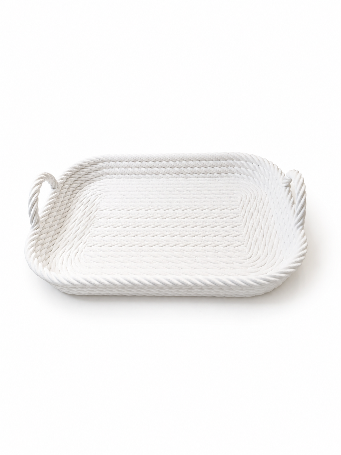 White woven tray with handles on a white background